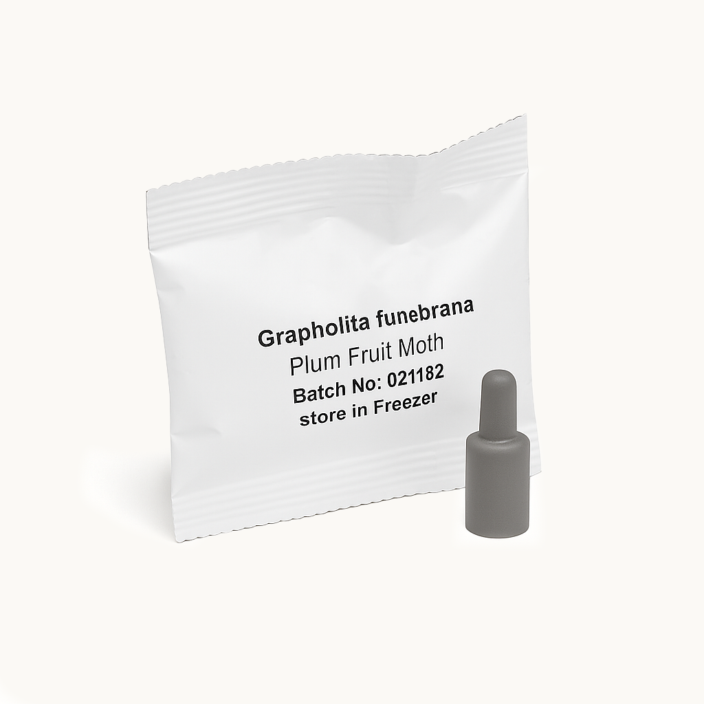 Pheromone lure sachet labelled “Grapholita funebrana – Plum Fruit Moth” with a grey plastic pheromone dispenser on a white background.