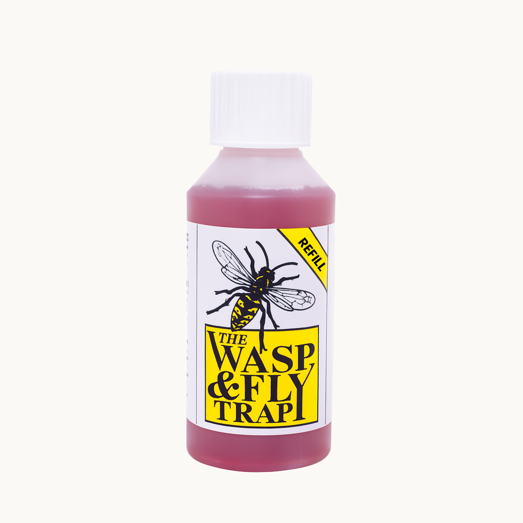 Bottle of wasp and fly trap refill with a yellow label featuring a wasp illustration on a white background.